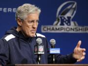 Seattle Seahawks head coach Pete Carroll talks to reporters Wednesday, Jan. 14, 2015 before NFL football practice in Renton. The Seahawks will face the Green Bay Packers Sunday in the NFC Championship game. (AP Photo/Ted S.