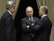 Senate Minority Leader Mike Hewitt, right, R-Walla Walla, center, speaks with Sen. Joe Zarelli, R-Ridgefield, right, and Sen.