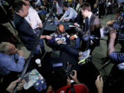 Seattle Seahawks defensive lineman Michael Bennett kicks back during Wednesday's media session.