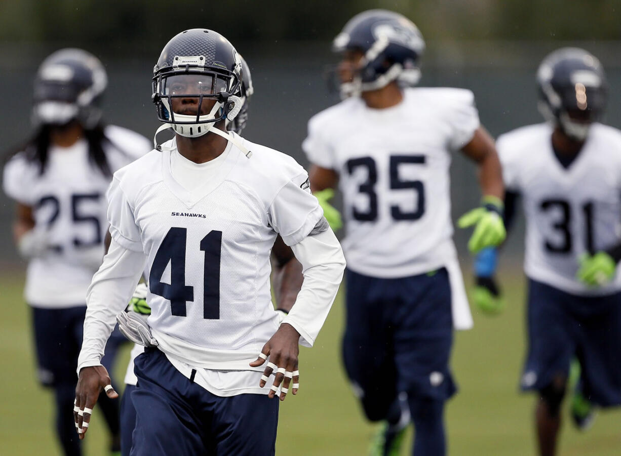 Seattle Seahawks' Byron Maxwell (41) runs drills during a team practice for Super Bowl XLIX, Thursday, Jan. 29, 2015, in Tempe, Ariz. The Seahawks play the New England Patriots in Super Bowl XLIX on Sunday, Feb.