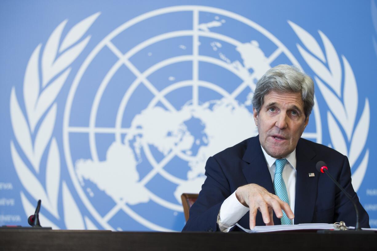 Secretary of State John Kerry gestures during a news conference after he delivered remarks to the United Nations Human Rights Council on Monday in Geneva.