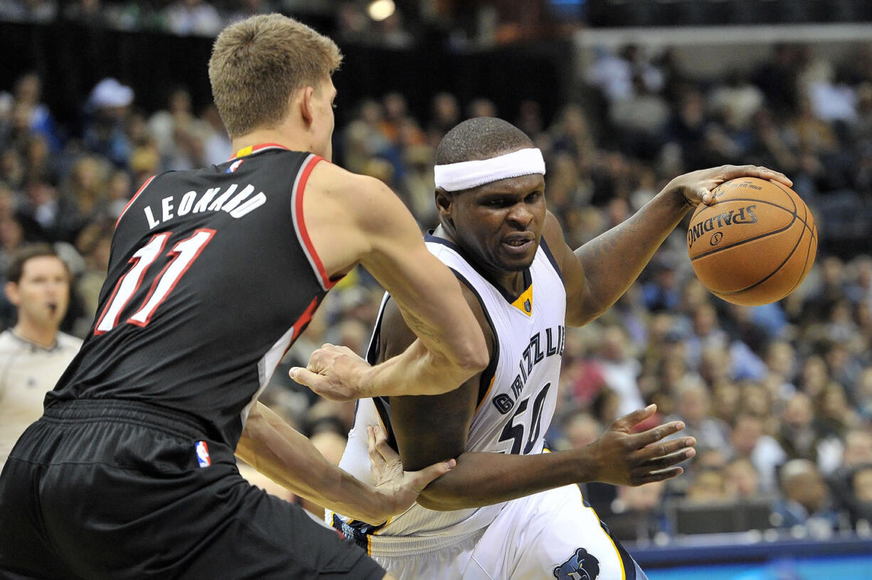 Memphis Grizzlies forward Zach Randolph (50) drives around Portland Trail Blazers center Meyers Leonard (11) during the second half Saturday, Jan. 17, 2015, in Memphis, Tenn. The Grizzlies won 102-98.