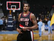 Portland Trail Blazers forward LaMarcus Aldridge leaves the court after scoring 39 points against the Denver Nuggets in the Trail Blazers' 105-103 victory in Denver on Tuesday.