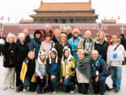 Friendly Planet Travel participants pose in Tiananmen Square in Beijing.