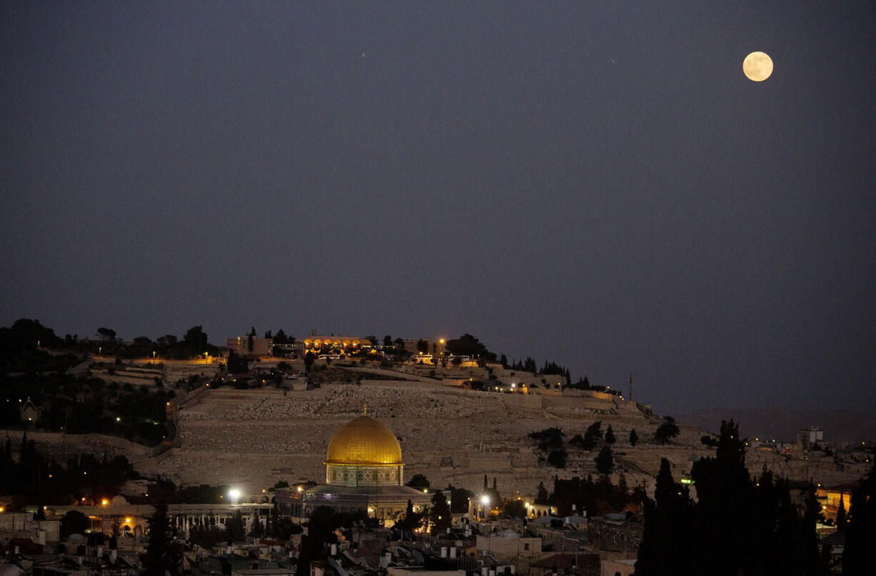 Associated Press files
The roof restaurant of the Notre Dame hotel straddles the invisible line between east and west Jerusalem and offers an elevated view of the adjacent holy sites.