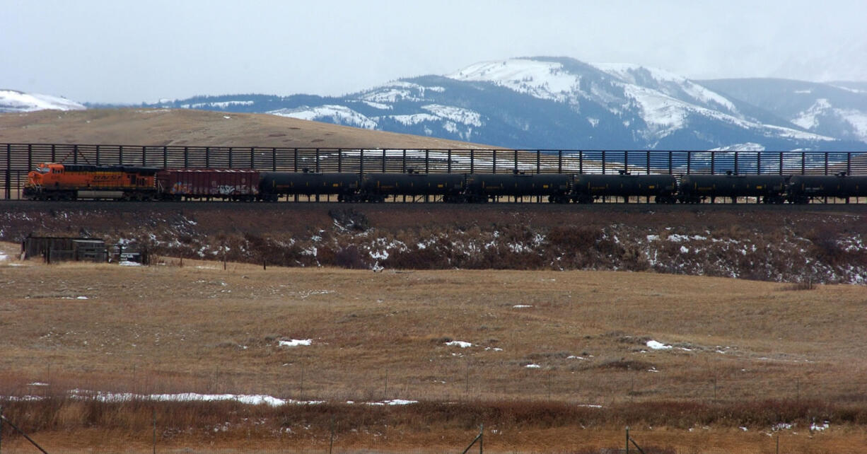 A train hauls oil into Glacier National Park near the Badger-Two Medicine National Forest in northwest Montana in 2013.