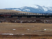 A train hauls oil into Glacier National Park near the Badger-Two Medicine National Forest in northwest Montana in 2013.