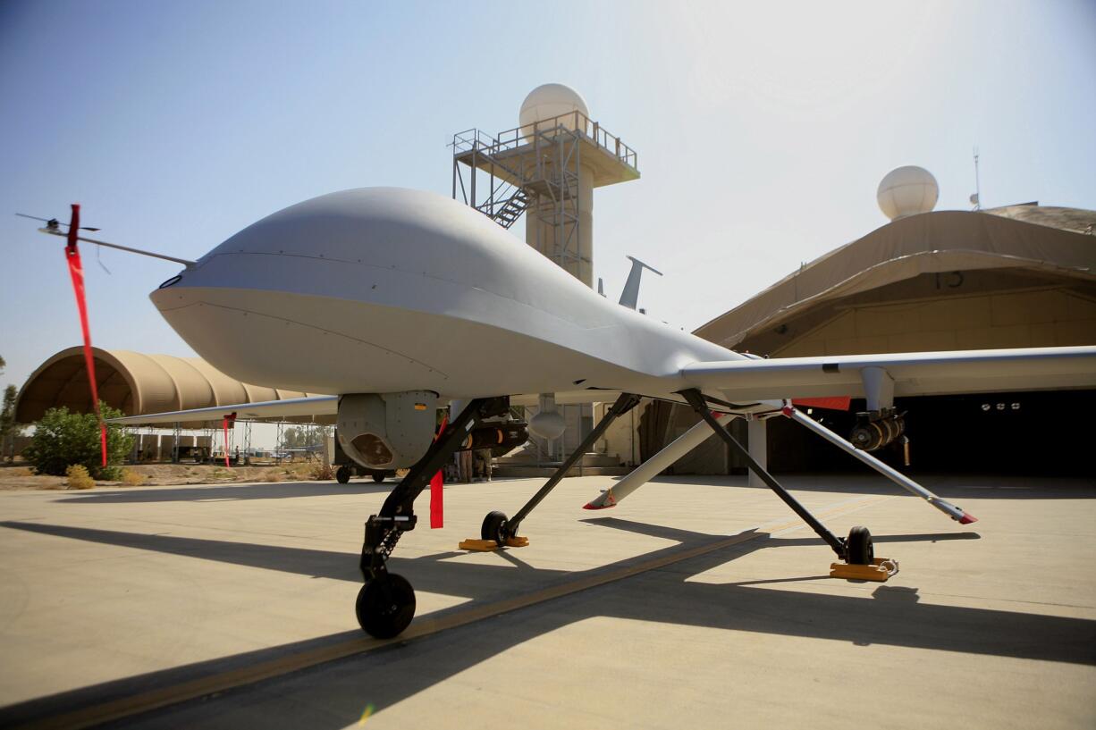 A MQ-4 Predator controlled by the 46th Expeditionary Reconnaissance Squadron stands on the tarmac in June 2007 at Balad Air Base, north of Baghdad, Iraq. A Pentagon official says the U.S. has started flying armed drones over Baghdad to protect U.S. civilians and military forces in the Iraqi capital. The official said the flights started in the last 24 to 48 hours to bolster manned and unmanned reconnaissance flights the military has been sending over violence-wracked Iraq in recent weeks.