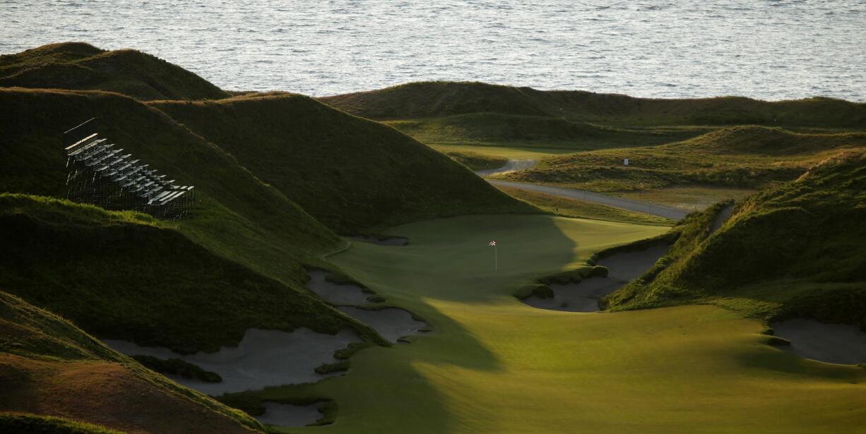 The 10th hole of Chambers Bay is shown at sunset. The course, which opened in 2007, will become the youngest golf course to host the U.S.