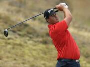 Michael Putnam watches his tee shot  on the fifth hole during the first round of the U.S.