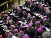 Bishops attend a morning session of a two-week synod on family issues at the Vatican on Monday.