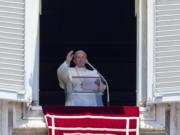 Pope Francis celebrates the Angelus noon prayer from his studio window overlooking St.