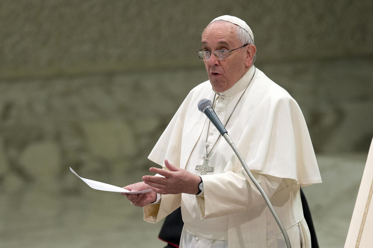 Pope Francis delivers his speech during his weekly general audience, in the Pope Paul II hall, at the Vatican on  Wednesday.