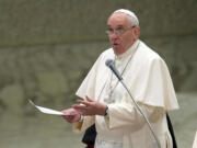 Pope Francis delivers his speech during his weekly general audience, in the Pope Paul II hall, at the Vatican on  Wednesday.