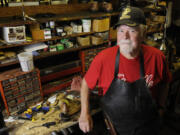 U.S. Marine Corps veteran, Bill Marino, who served in Vietnam, is photographed at Marino's Boots and Saddles in Coquille, Ore., on Aug. 21, 2015. He is a member of the Marine Corps League Coquille River Detachment 1042.