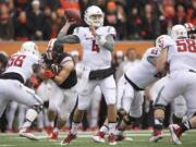 Washington State quarterback Luke Falk (4) passes against Oregon State in Corvallis, Ore., Saturday, Nov. 8, 2014.