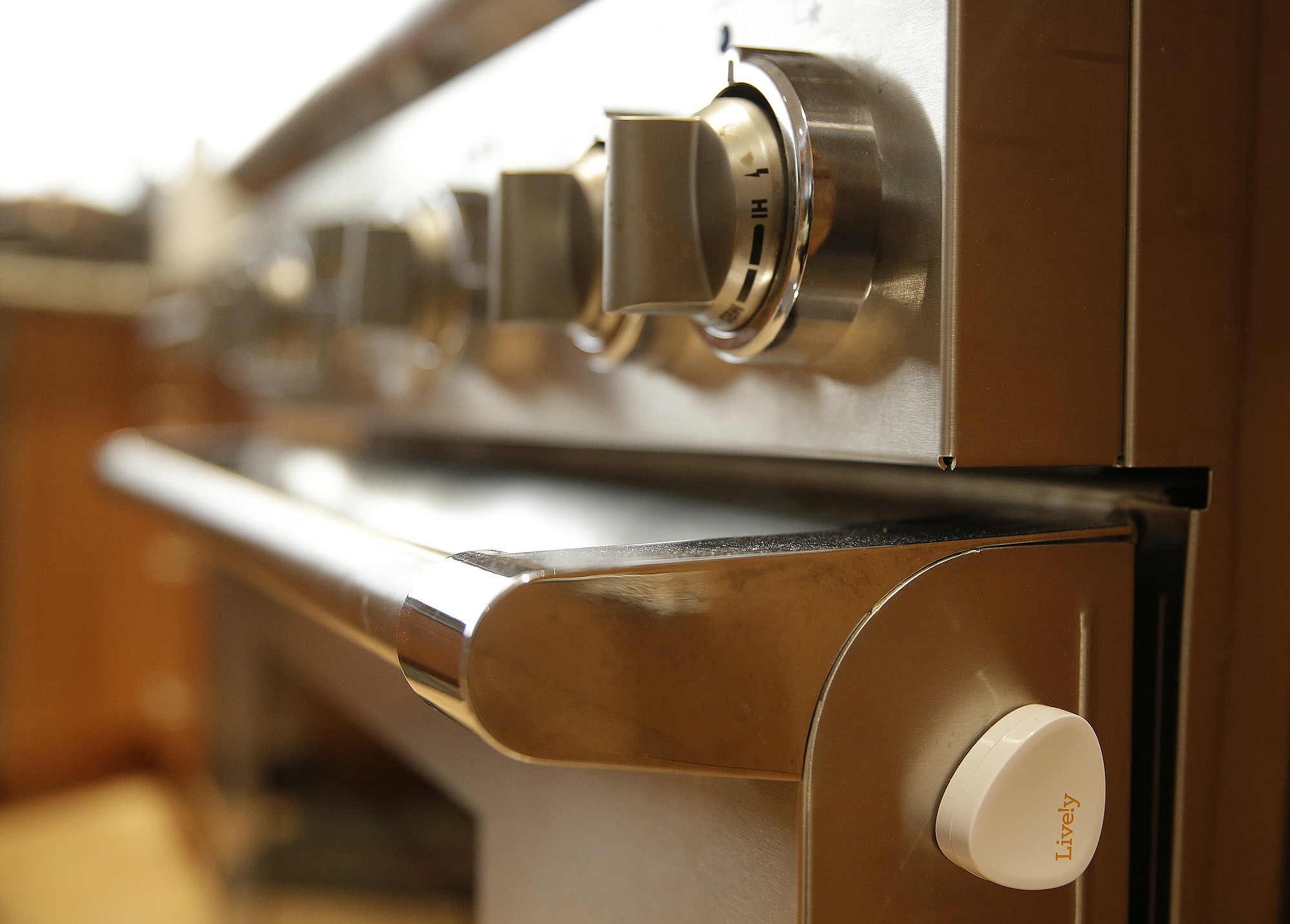 A small motion detector is attached to the side of an oven in Dorothy and Bill Dworsky's home in San Francisco.