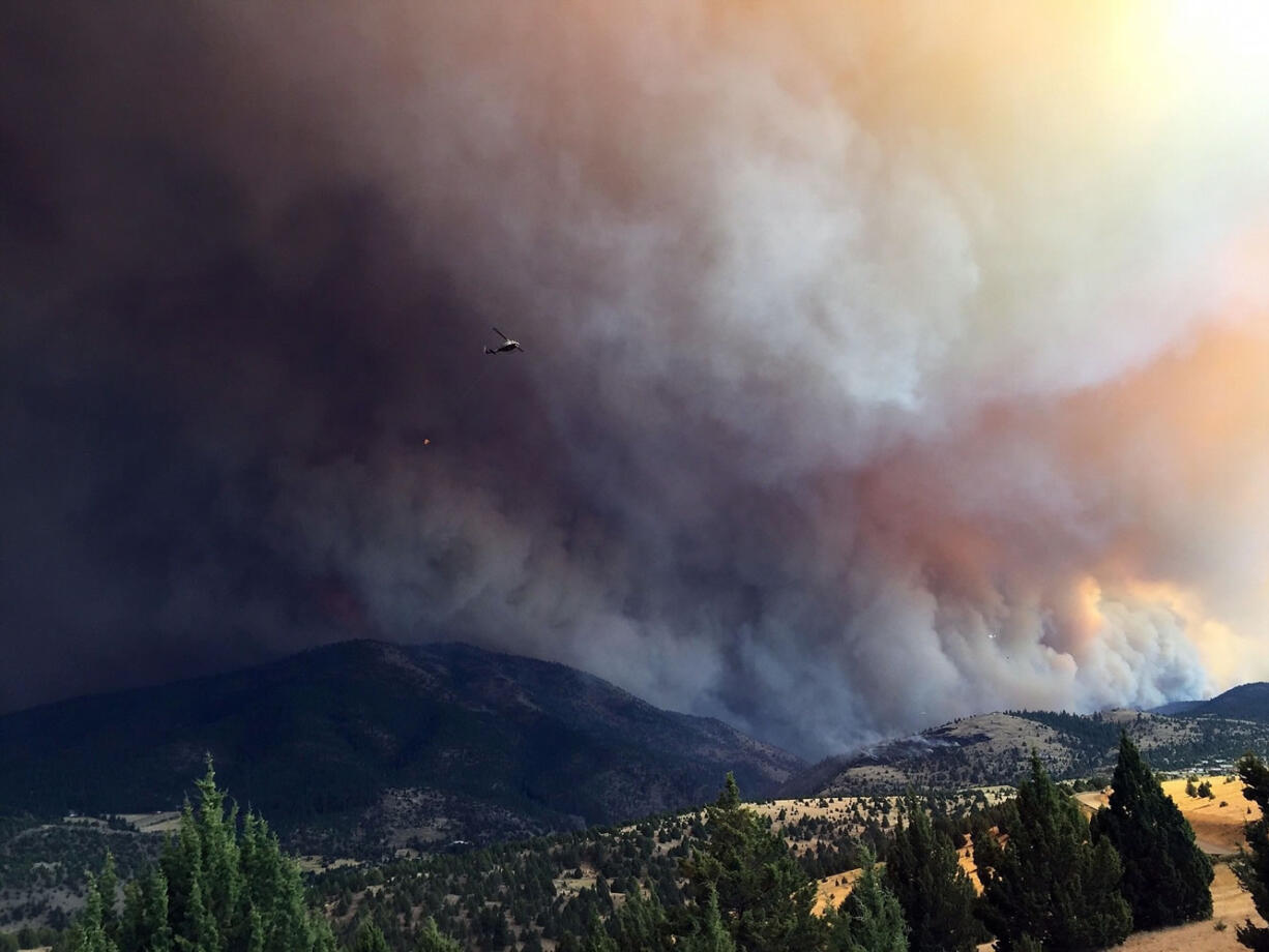 Scenes Friday from the Canyon Creek Complex fire south of John Day.