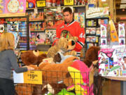 Winterhawks defenseman Keoni Texeira was one of several Winterhawks players who recently shopped for toys and clothes with 25 students from Portland's Lincoln Park Elementary School.