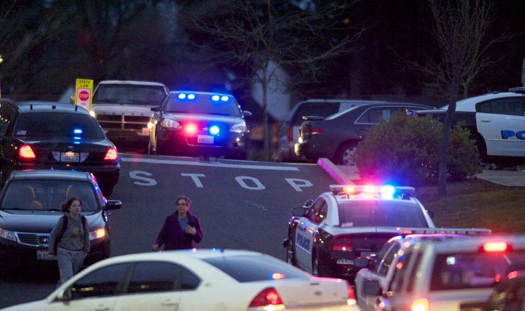 People are evacuated from the Center for Community Health after reports of shots fired on Tuesday.