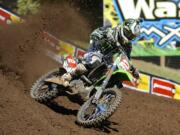 Ryan Villopoto races ahead of the field in the 450 class at the Lucas Oil Pro Motocross Championships in Washougal on Saturday, July 20, 2013.