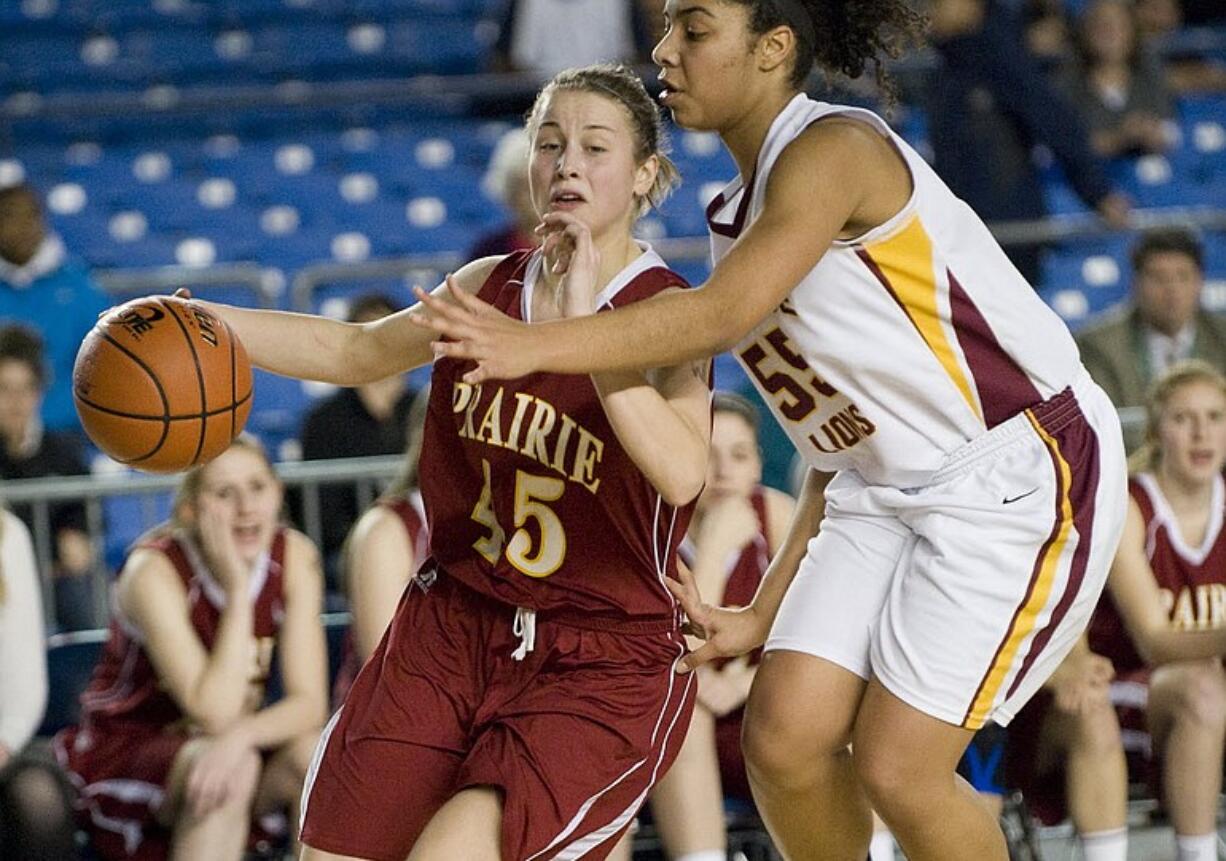 Prairie's Jackie Lanz drives to the basket against Lakeside during the 3A state basketball tournament Thursday at the Tacoma Dome.