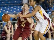 Prairie's Jackie Lanz drives to the basket against Lakeside during the 3A state basketball tournament Thursday at the Tacoma Dome.