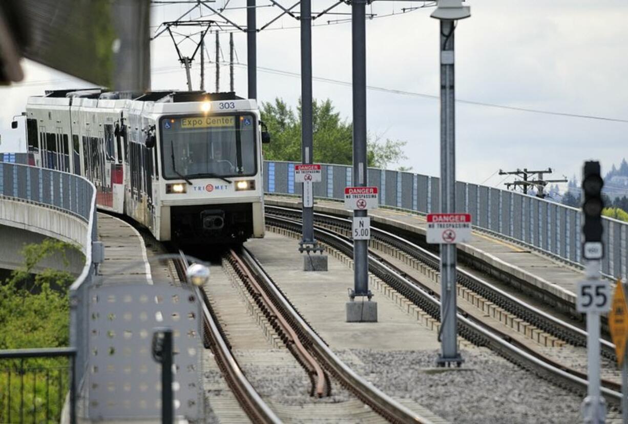 A Tri-Met Max light rail train makes its way to the Delta Park/Vanport light rail transit station May 6, 2010.