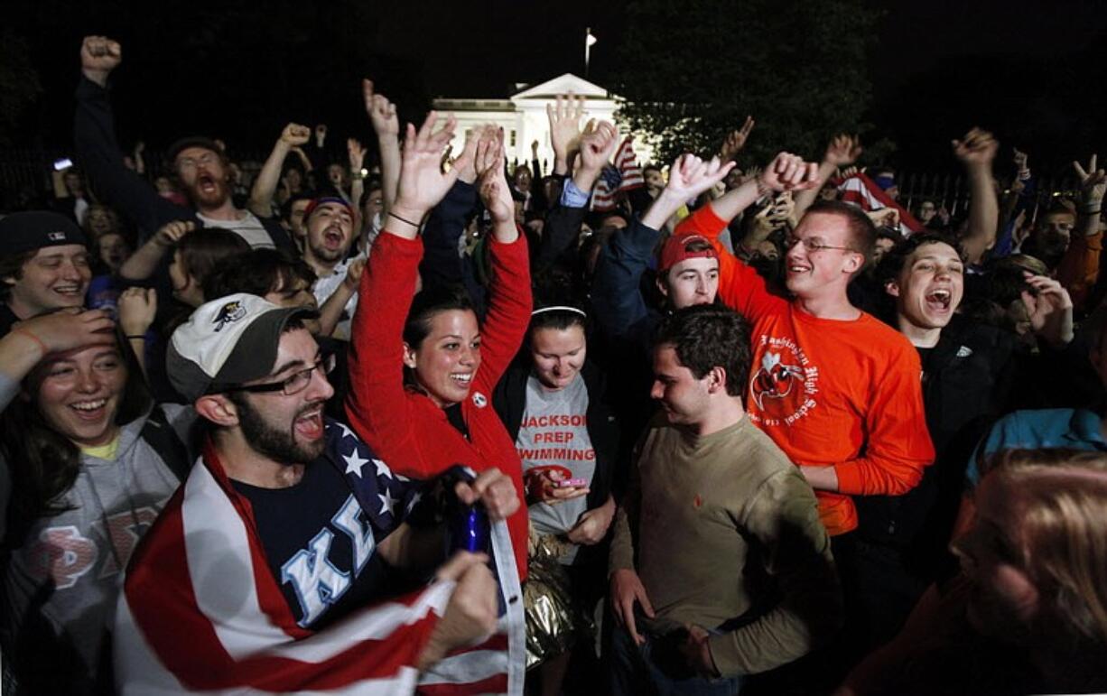 Crowds outside the White House react late Sunday to the news that terror mastermind Osama bin Laden has been killed by U.S.