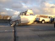 A Columbian.com reader captured this image of a boat that fell off it's trailer Thursday afternoon in the southbound lanes of Interstate 205 at the Glenn Jackson Bridge.