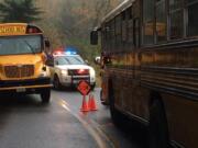 Eleven people, including four students, were injured in a crash that involved a school bus near Yacolt on Tuesday afternoon.Two other vehicles were also involved in the collision.