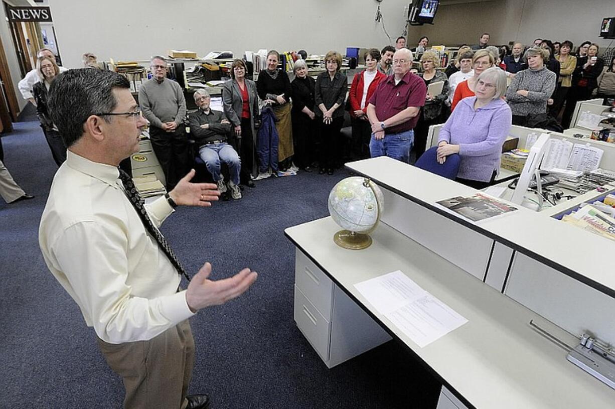 Columbian publisher Scott Campbell announces the company's emergence from chapter 11 during a staff meeting in the newsroom on Friday.