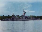 On the morning of May 18, 1980, the USS Rogers makes its way up the Columbia River while coming back from reserve training in San Diego, CA, to its home port of Portland as Mount St.