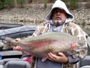 Larry Warren of Orofino, Idaho, with a 28.37 pound rainboat trout he caught below Dworshak Dam on the North Fork of the Clearwater River.