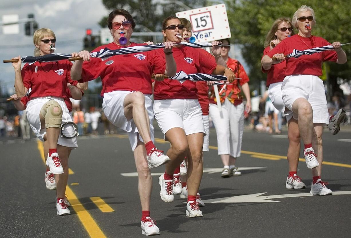 Columbian files
The Saturday morning Grand Parade always includes lots of hometown talent -- like the Battle Ground Firecracker Kazoo Band, shown marching proudly in 2006: Carol Domench, from left, Carroll Dodd, Margaret Charpilloz and Irene Holbrook.