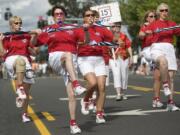 Columbian files
The Saturday morning Grand Parade always includes lots of hometown talent -- like the Battle Ground Firecracker Kazoo Band, shown marching proudly in 2006: Carol Domench, from left, Carroll Dodd, Margaret Charpilloz and Irene Holbrook.