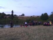 Emergency crews respond to a reported drowning Wednesday evening at Klineline Pond in the Salmon Creek area.