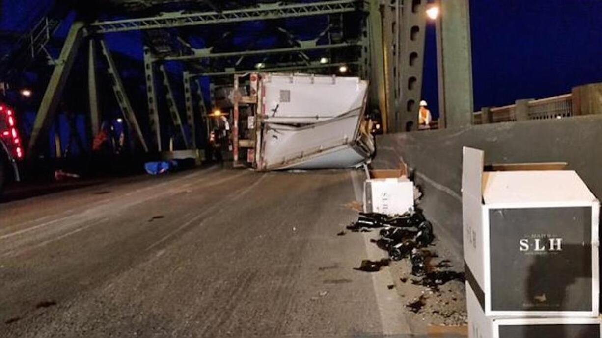 A semi crashed and overturned on the southbound Interstate 5 bridge, closing the highway for about five hours.