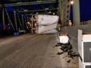 A semi crashed and overturned on the southbound Interstate 5 bridge, closing the highway for about five hours.