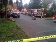 Vancouver firefighters rushed to 4505 E. 15th St. on Tuesday after a woman told emergency dispatchers that the house had caught fire and she was trapped in the attic.