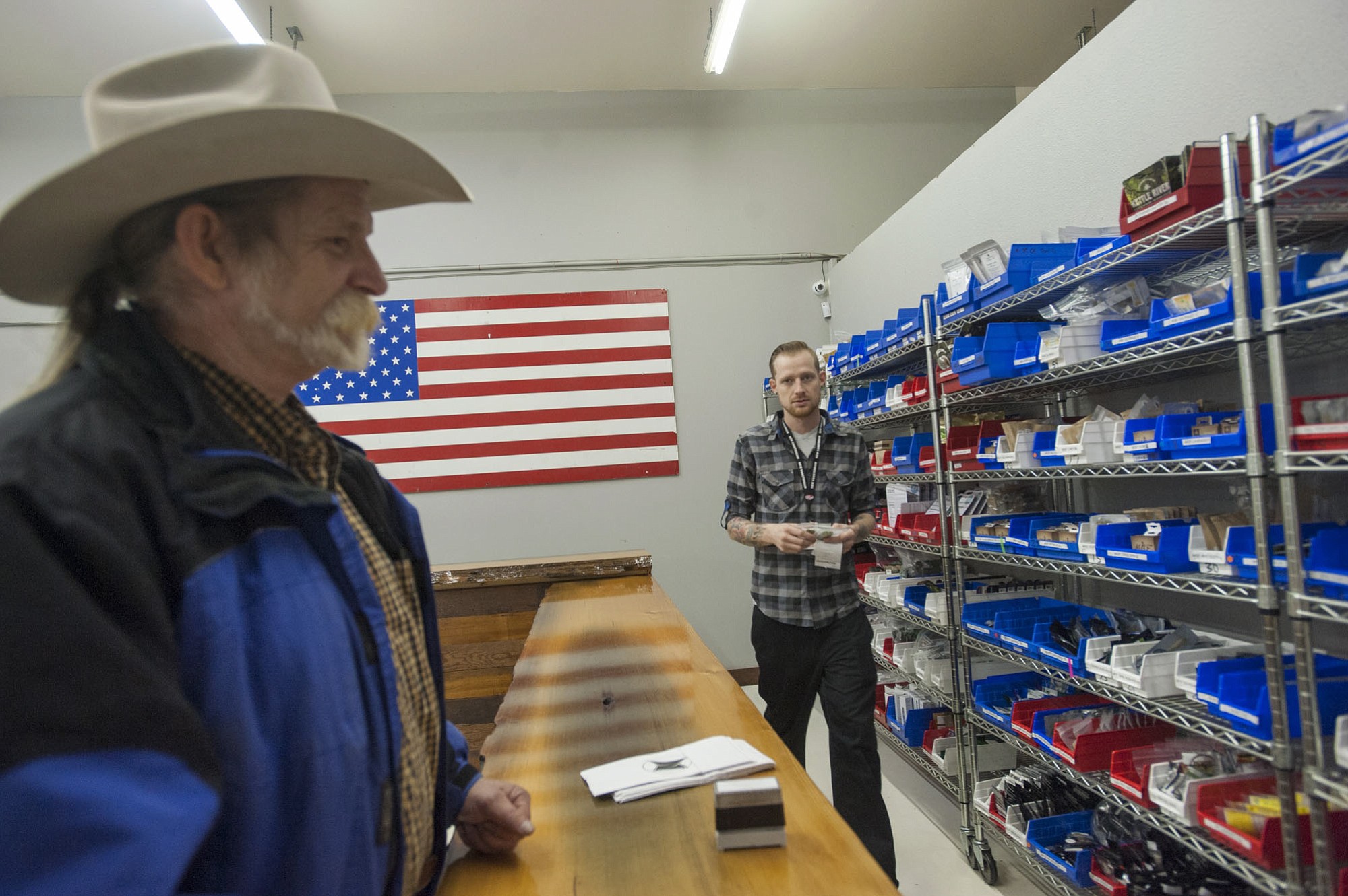 Corey Brane waits for his purchases at New Vansterdam in Vancouver.