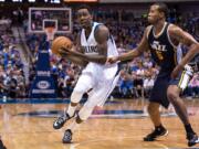 Al-Farouq Aminu played for Dallas last season after previous stints with New Orleans and the Los Angeles Clippers (Files/Associated Press)