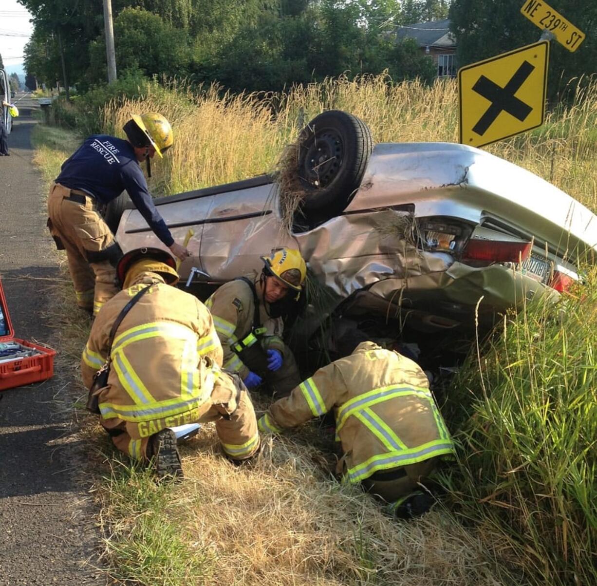 Clark County sheriff's deputies took a Battle Ground woman into custody for suspicion of reckless driving and driving with a suspended license after she reportedly clipped a pickup and rolled the vehicle Monday morning.