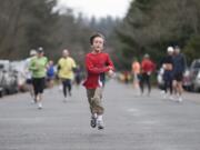 Evan Mrazik, 7, from Portland, runs at the Fort Vancouver National Historic Site.