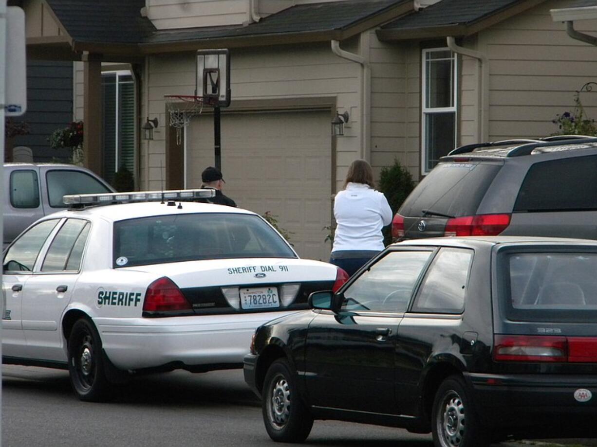 There was little activity Wednesday morning outside the Battle Ground home where a Clark County Sheriff's deputy's son accidentally shot himself Tuesday.