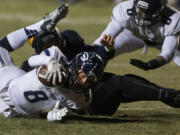 Skyview quarterback Zac Shomler stretches for extra yards during the Storm's 41-27 loss to Wenatchee.