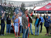 Sean Janson, executive director of Washington Timbers FC, toasts to the start of construction of two artificial turf fields at the Harmony Sports Complex. The club marked the start of construction with a celebration on Friday.