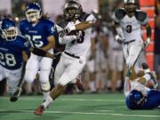 Union's Brandon Brody-Heim carries the ball against Mountain View in the first half at McKenzie Stadium on Friday October 1, 2010.