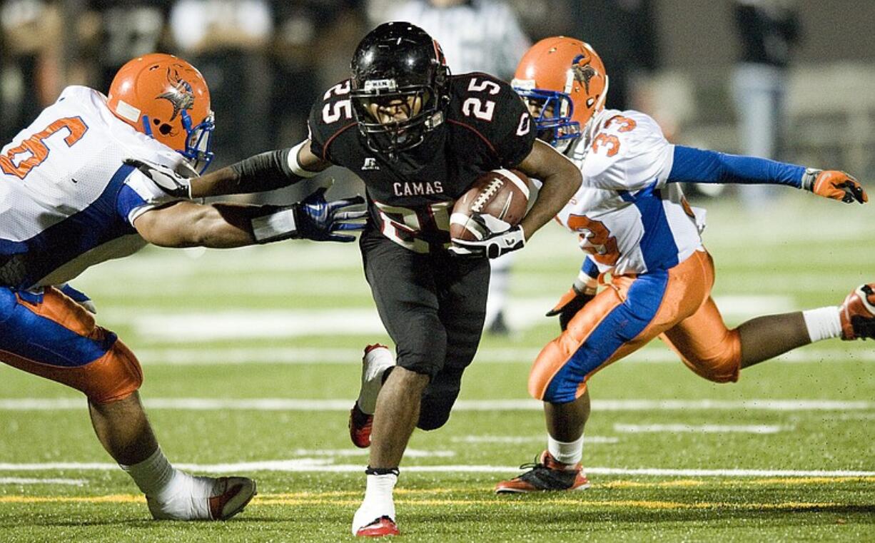 Camas RB Zach Marshall, #25, runs the ball against Rainier Beach at Doc Harris Stadium, Friday, November 5, 2010.