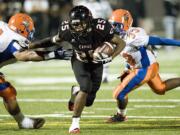 Camas RB Zach Marshall, #25, runs the ball against Rainier Beach at Doc Harris Stadium, Friday, November 5, 2010.